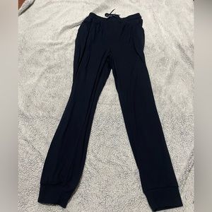 Navy blue joggers, soft material, size medium